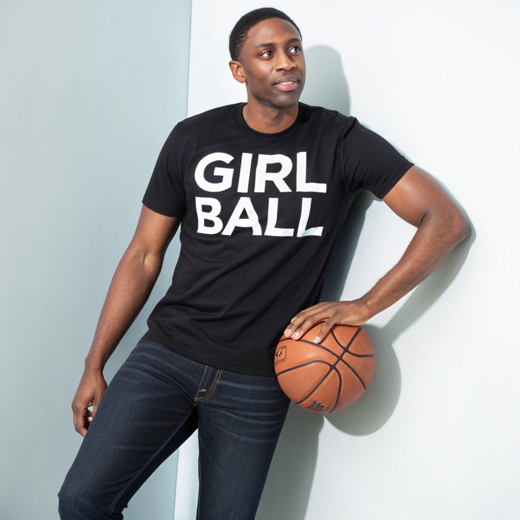 Modeling shirt with basketball in hand